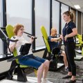 UQ Master of Clinical Exercise Physiology student practitioner Kristin Murray works with Emeritus Professor Tian Po Oei and his wife Elizabeth at UQ Healthy Living.